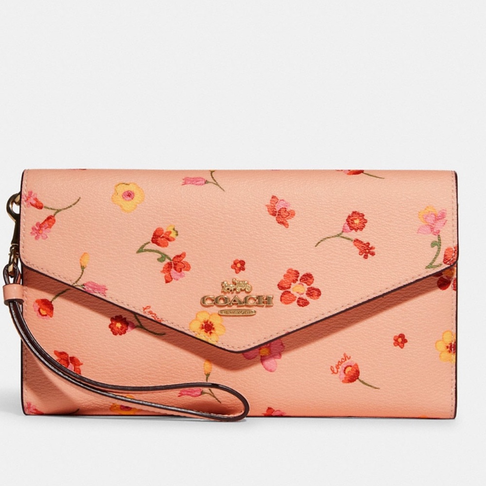 NEW FLORAL CLUTCH WITH TAGS ATTACHED PRICE INCLUDED IN PLASTIC BRAND NEW LARGE